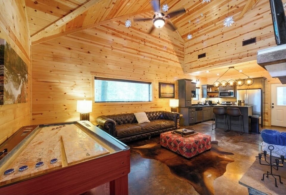 Game night ready: Cozy seating + shuffleboard entertainment.
