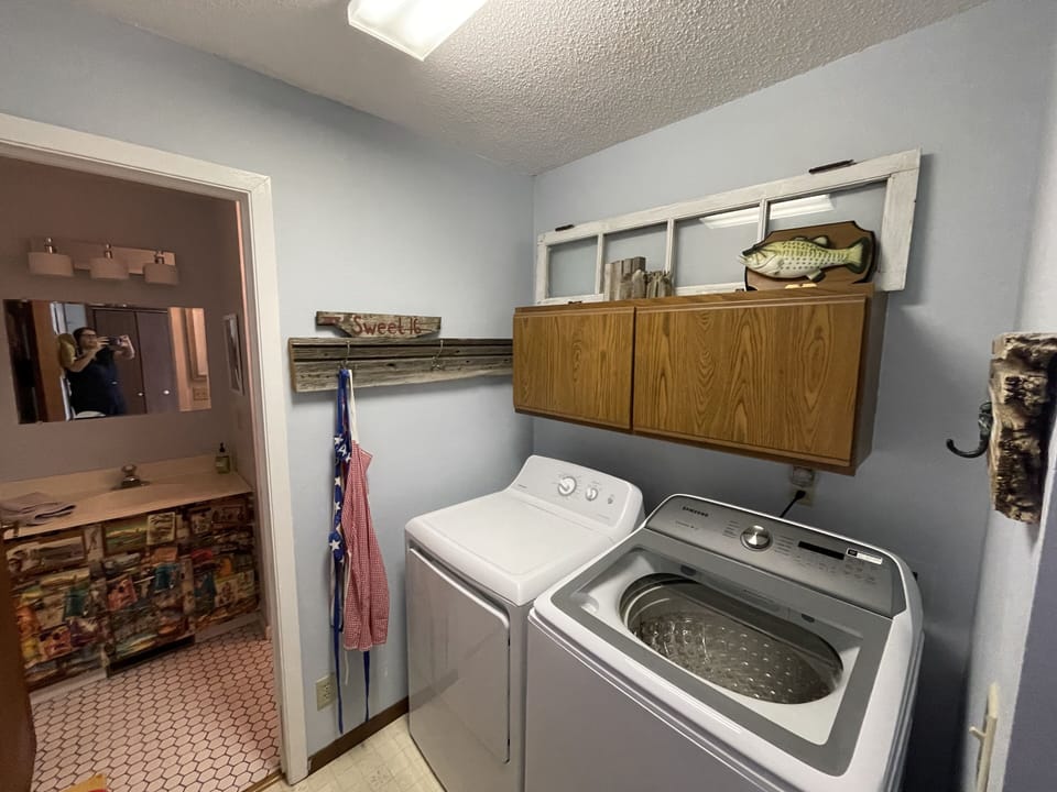 Laundry and half bath off of the garage entrance on the main level. 