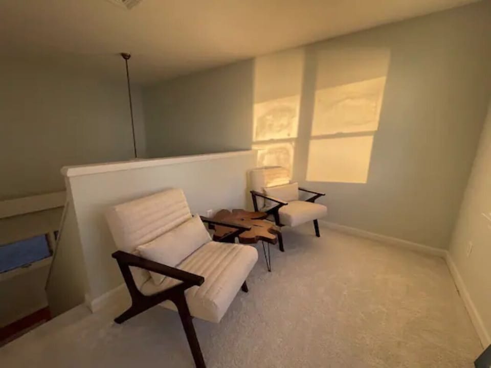 Upper loft is great for reading or sharing cocktails at sunset