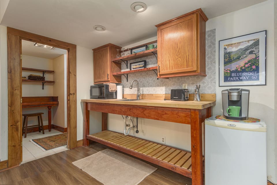Your kitchenette with fridge, microwave, coffee maker and toaster and air fryer.