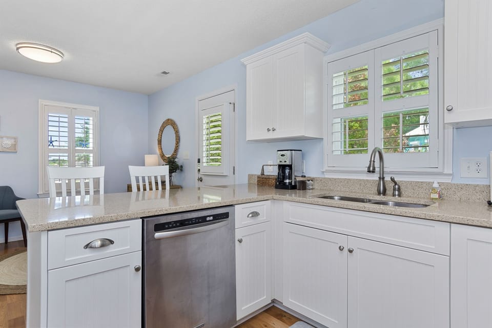 The kitchen has a dishwasher so you don't have to wash all those pots and pans by hand!