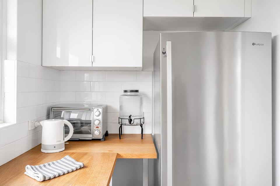 The kitchen has a fully size fridge, toaster oven, etc.