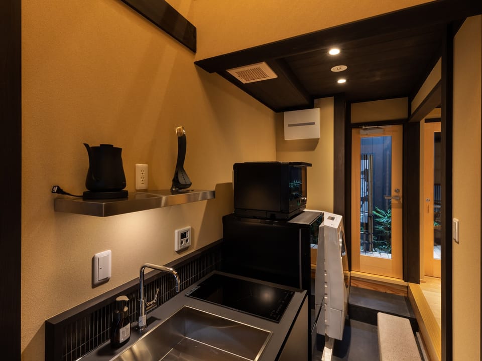 Villa | Private kitchen | Fridge, microwave, stovetop, griddle