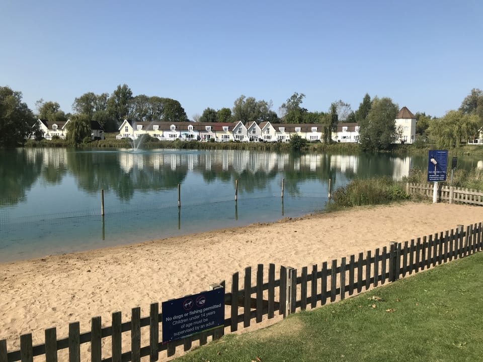 Sandy beach on Isis Lake