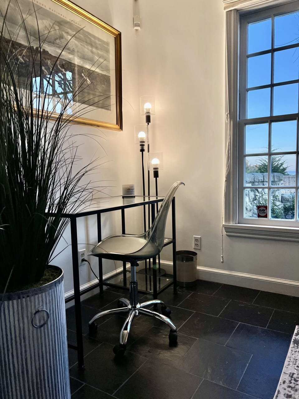 Desk with natural sunlight and floor lamp 