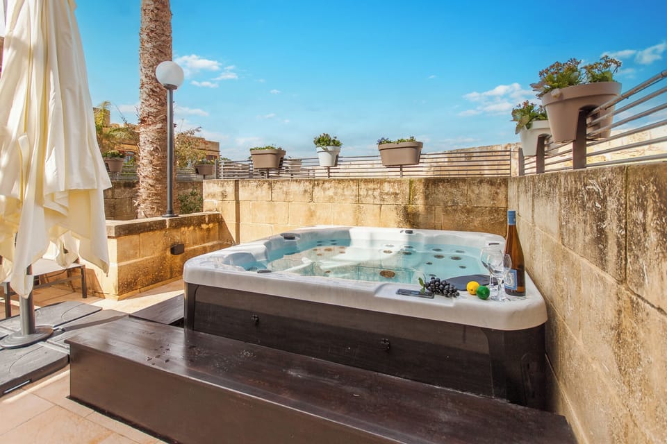 Family House, Multiple Bedrooms, 2 Bathrooms (Harbour Views Gozitan Villa + Shared) | Outdoor spa tub