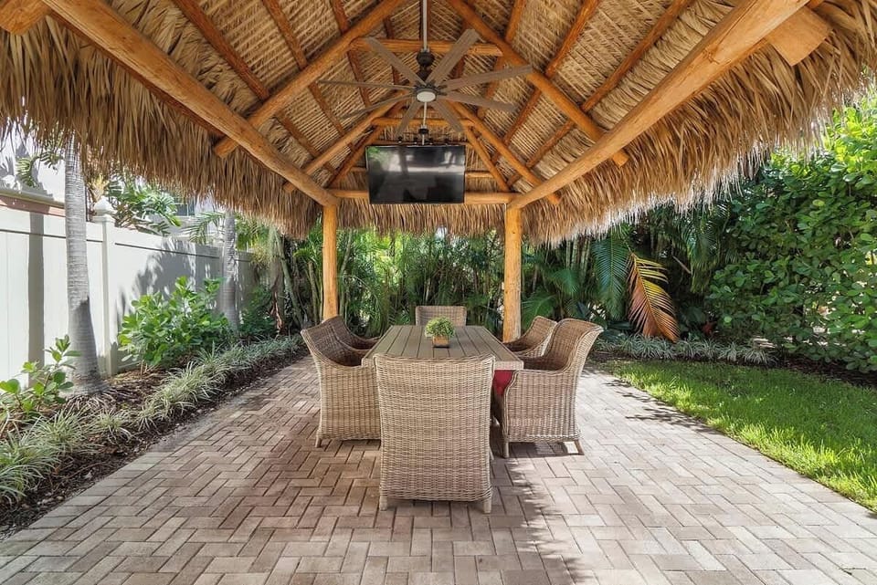 Relax under the shady Tiki Hut, fire up the grill and watch the big game on the outside TV with friends and family!