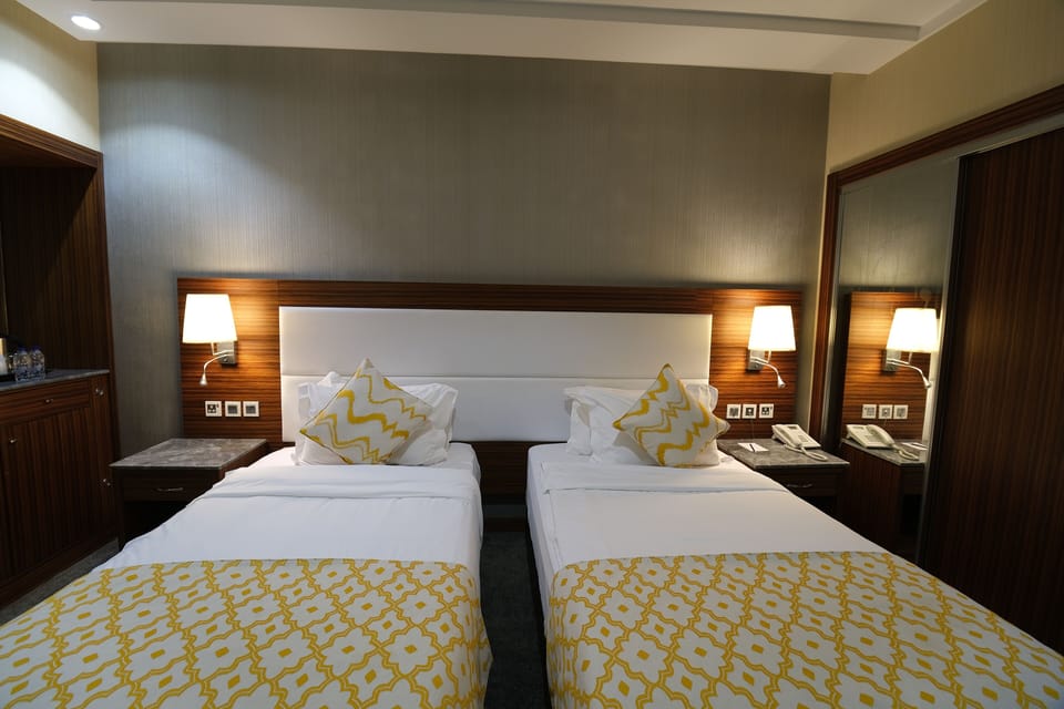 Basic Twin Room | Free minibar, in-room safe, iron/ironing board, free WiFi