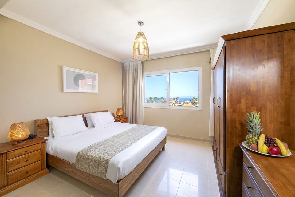 Family Apartment | Minibar, in-room safe, blackout drapes, iron/ironing board