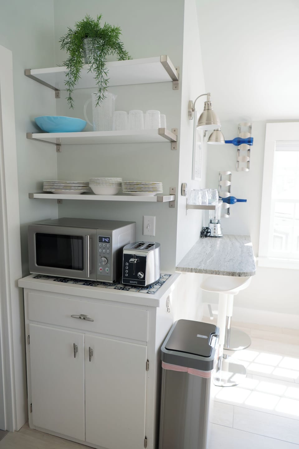 Kitchen with microwave, blender, and toaster