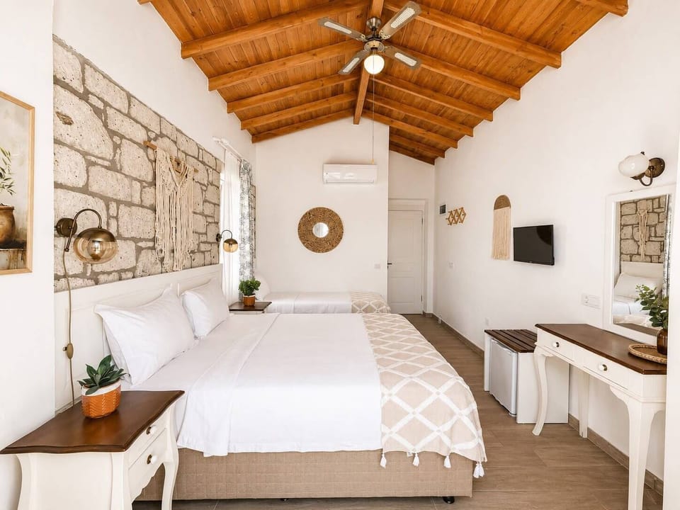 Superior Triple Room, Balcony, Pool View | Hypo-allergenic bedding available, minibar, in-room safe