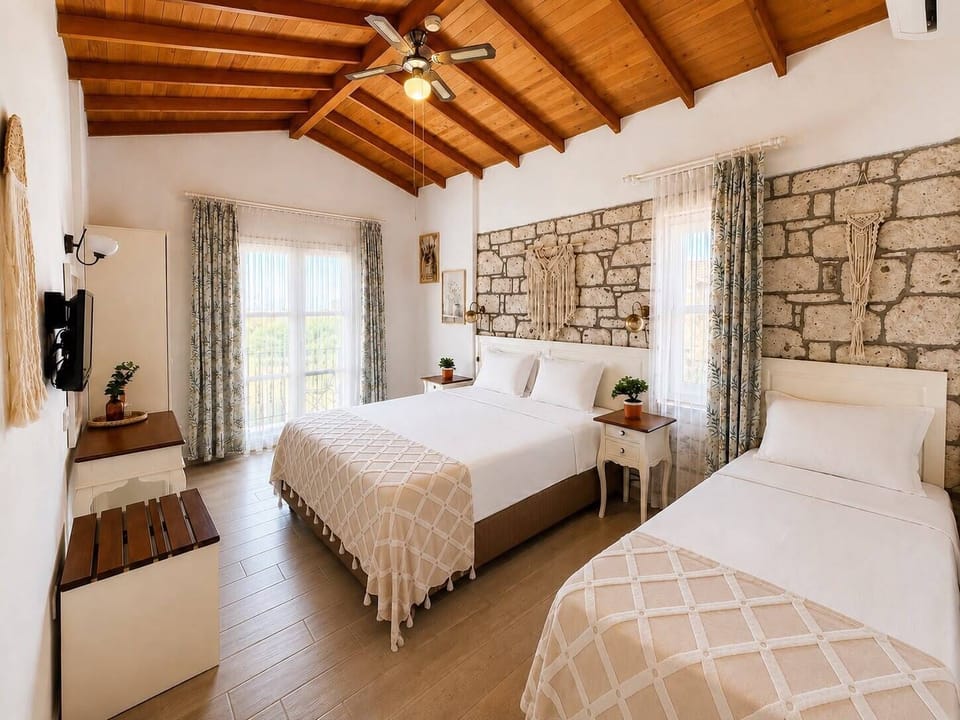 Superior Triple Room, Balcony, Pool View | Hypo-allergenic bedding available, minibar, in-room safe