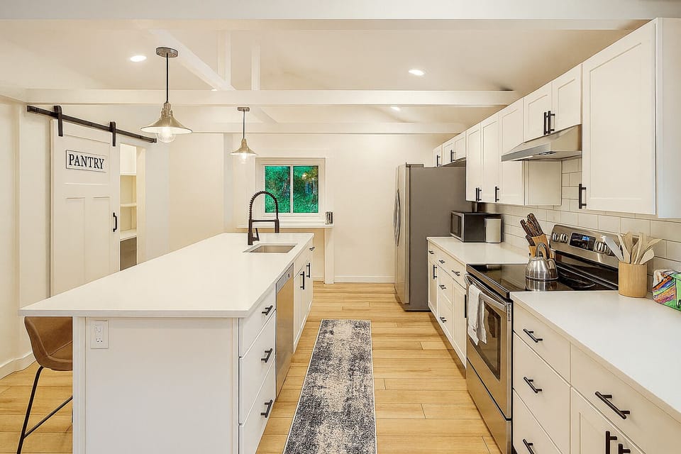 A bright, modern kitchen fully stocked for your stay