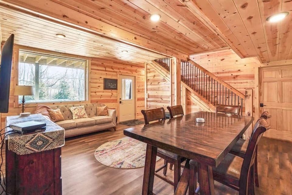 Living Room: Enjoy spacious gatherings with stunning wood accents and inviting natural light!