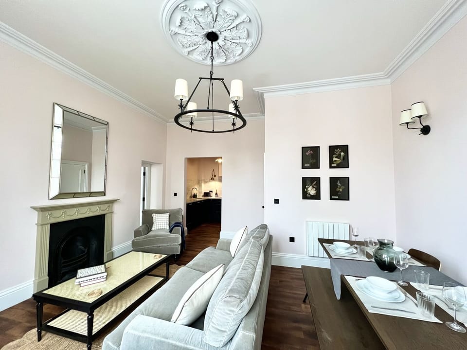 Living Room with Smart TV and Dining Table (2)