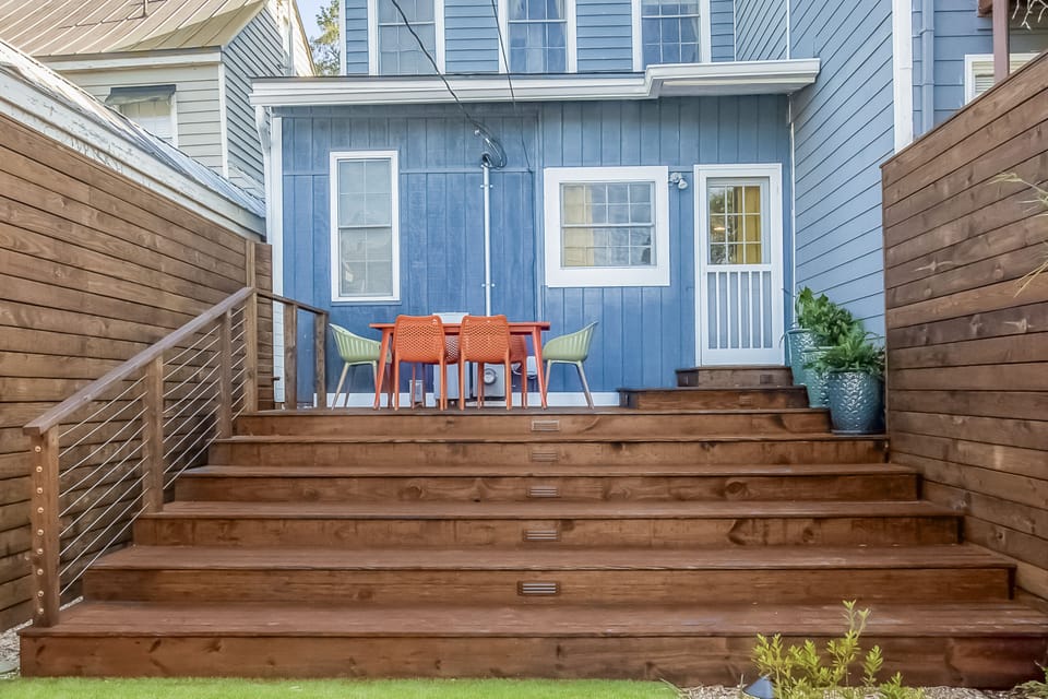 Large deck off the kitchen with deep steps, safe for all!