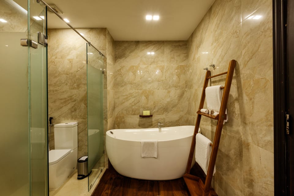 Beach Splash Room | Bathroom | Designer toiletries, hair dryer, bathrobes, slippers