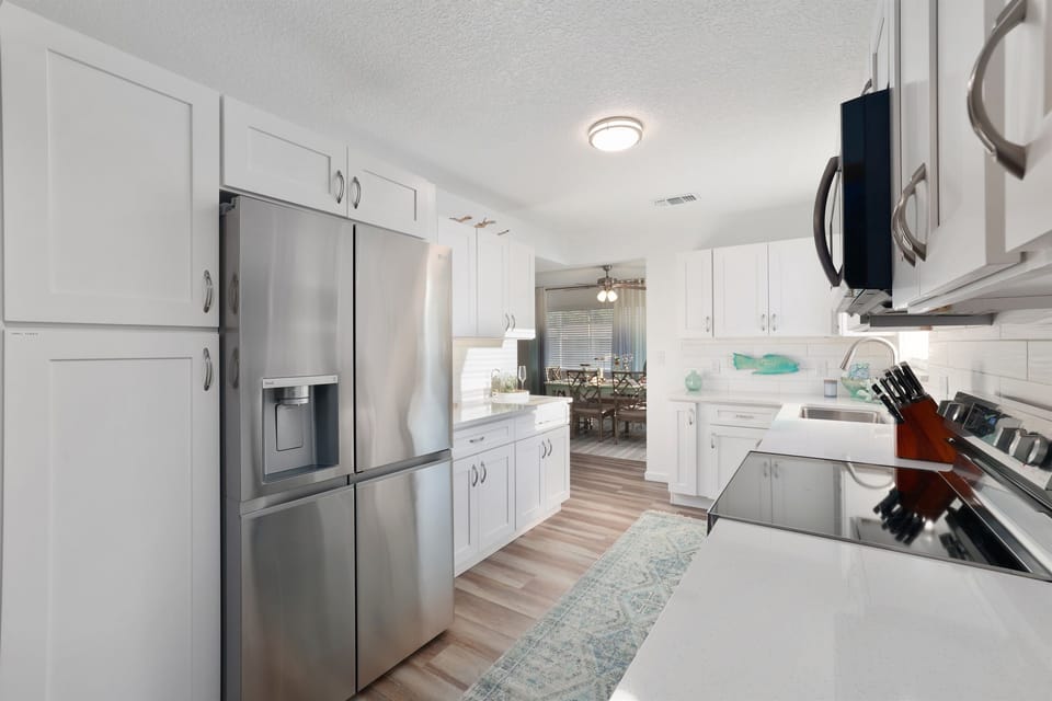 Bright, fully stocked kitchen—perfect for easy meals, coffee, and gathering together