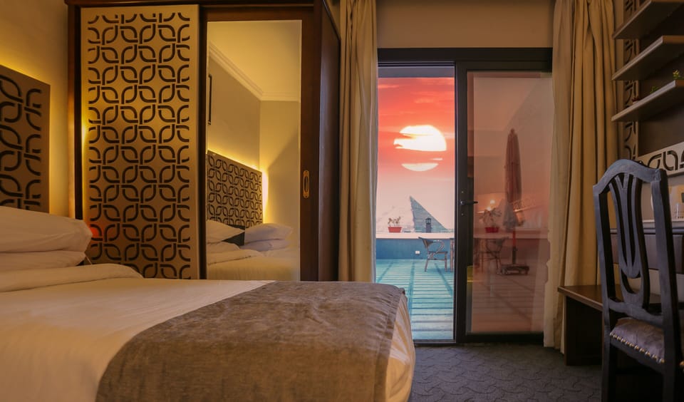 Deluxe Double/Twin Room - Pyramids View With Terrace | Premium bedding, down comforters, pillowtop beds, minibar