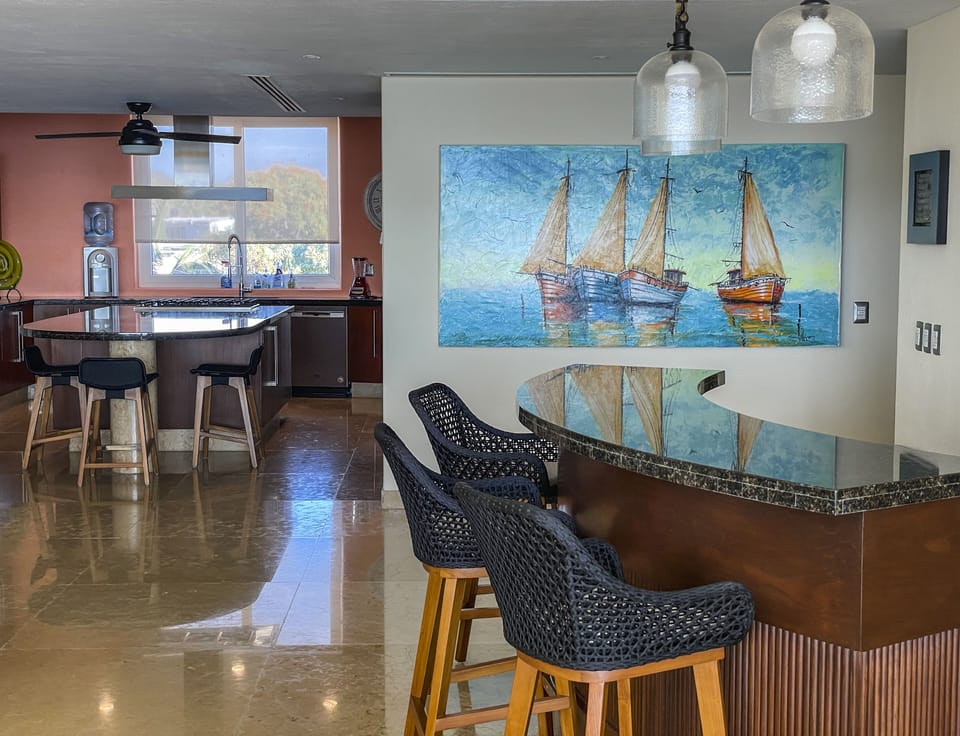 Bar with ice maker and beverage center