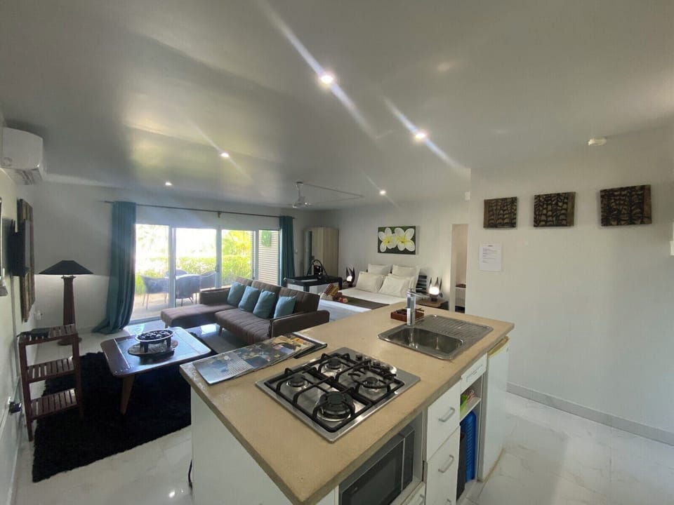 Deluxe Quadruple Room, Ocean View | Private kitchenette | Full-size fridge, microwave, oven, stovetop