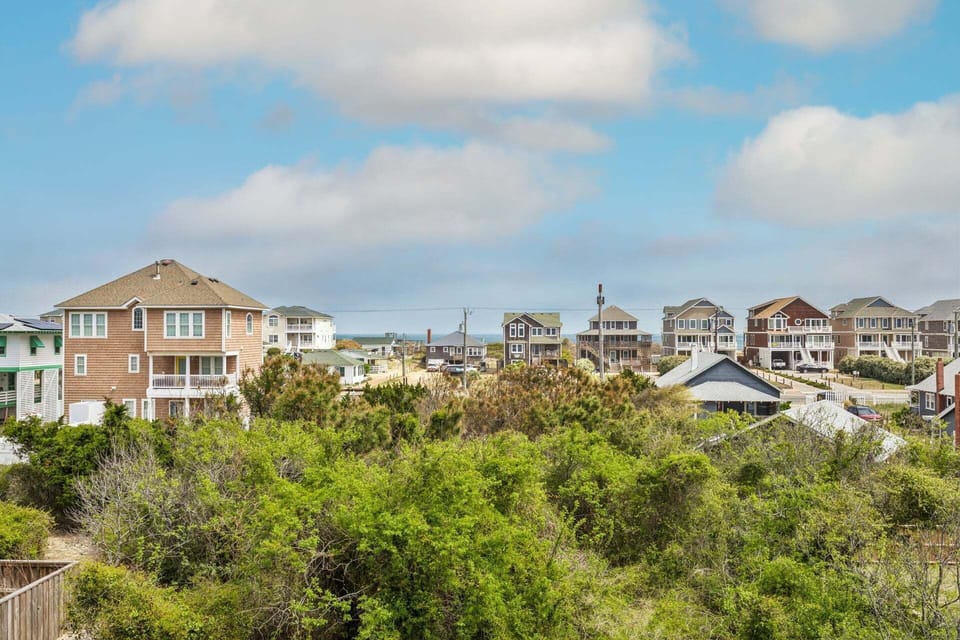 Step onto the deck through the sliding door off of the dining area and soak in the salty breeze while you enjoy views of the Atlantic ocean.