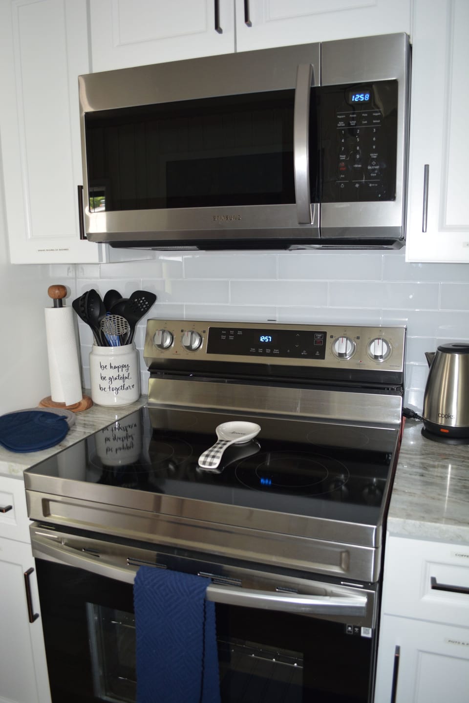 Brand new stainless steel appliances.