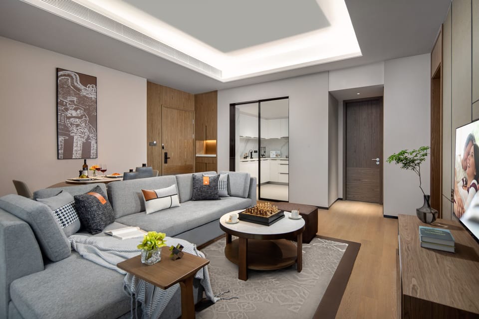 Premier Room, 1 Bedroom | Living room | 55-inch LED TV with satellite channels, TV, DVD player