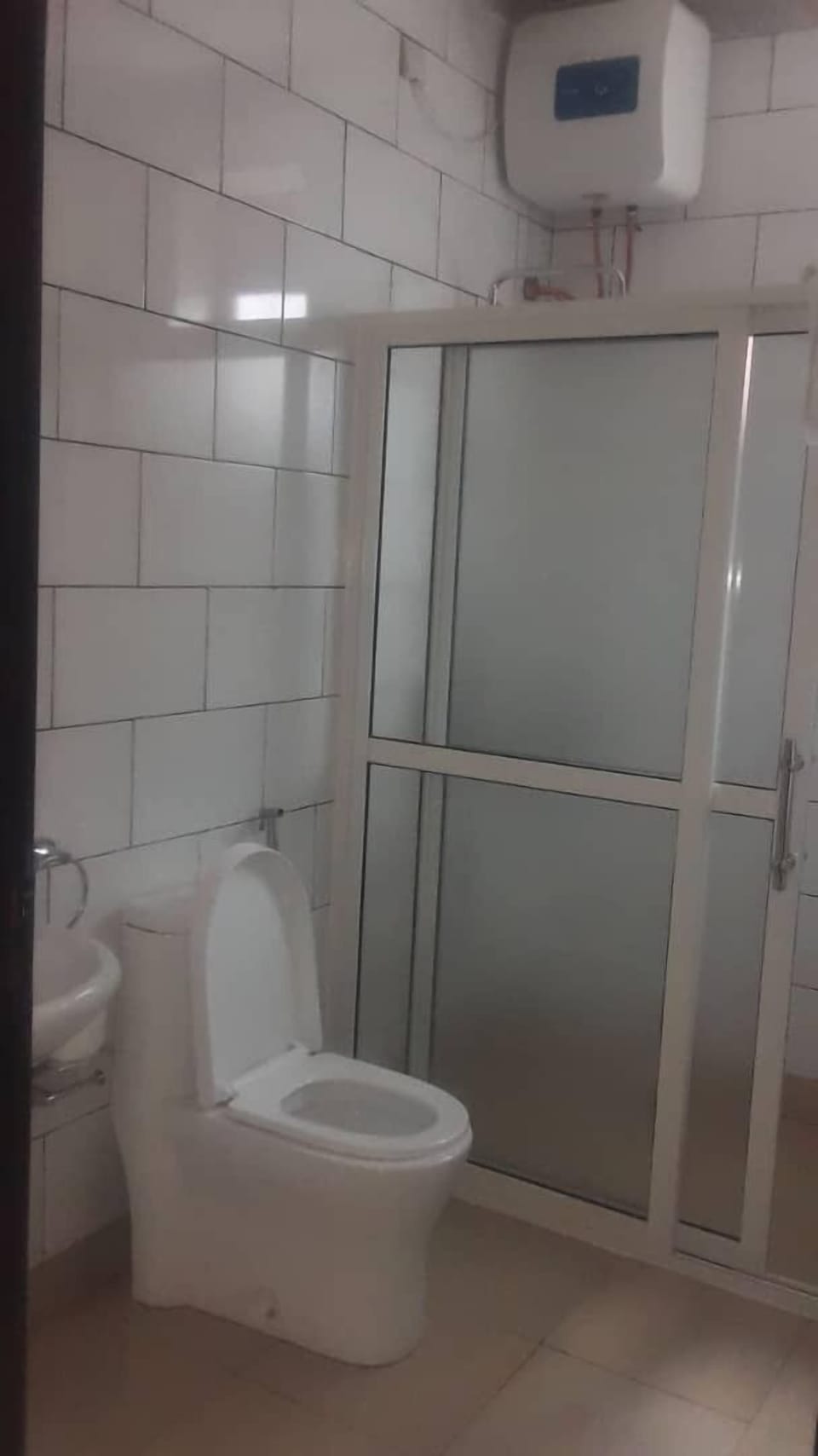 Raised toilet seat