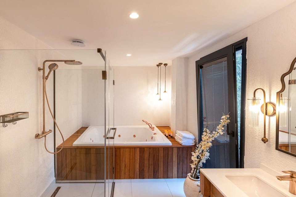 Royal Studio Suite | Bathroom | Designer toiletries, hair dryer, bathrobes, slippers