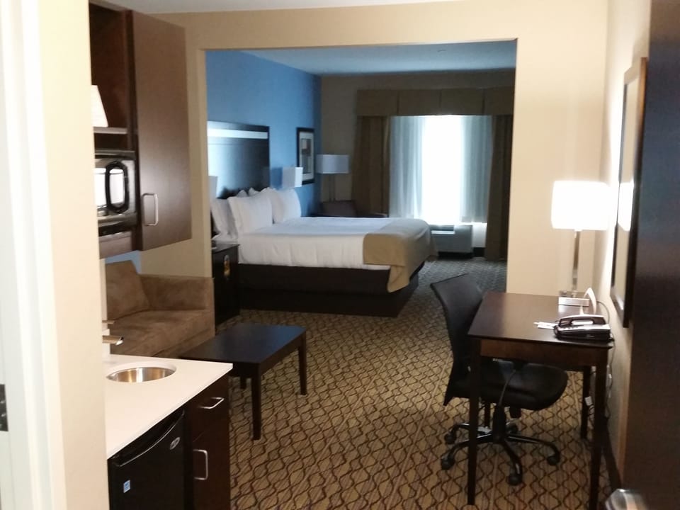Suite, 1 King Bed | In-room safe, desk, laptop workspace, iron/ironing board