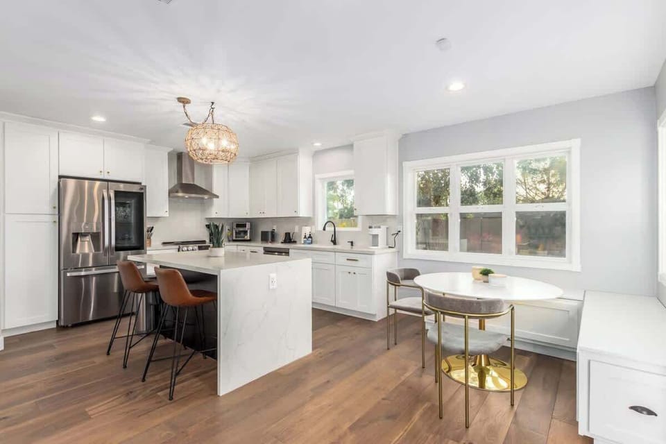 Updated kitchen with island seating and breakfast nook