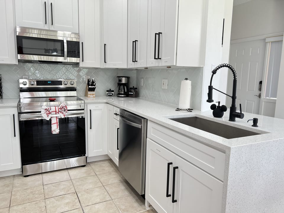 Brand new Kitchen… new appliances, cabinets, Disney dishes and more…
