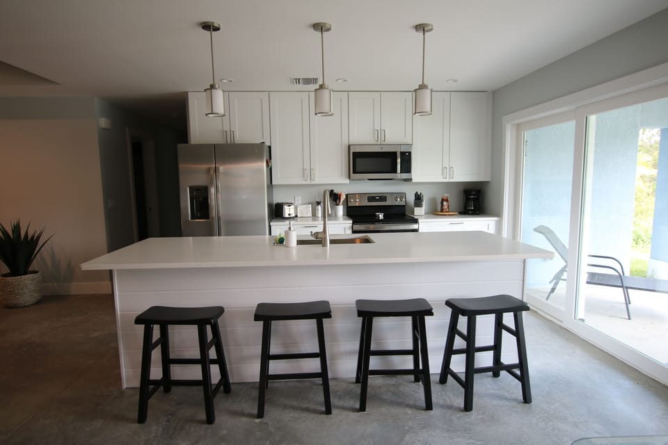 Kitchen and the island with seating for 4 