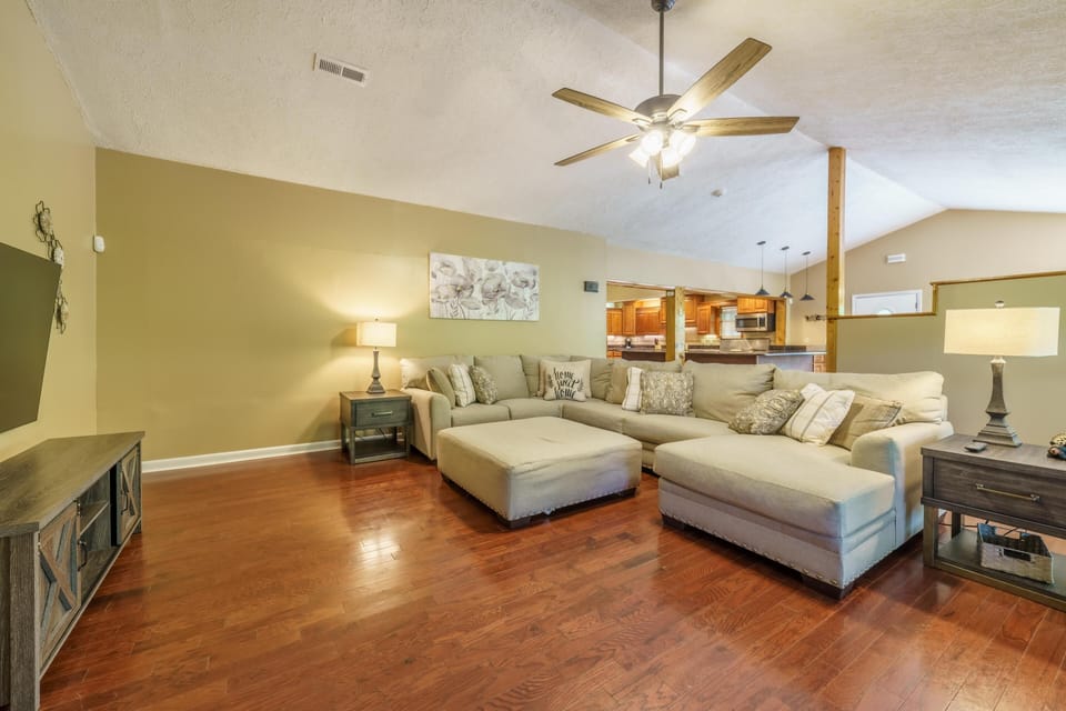 Large sectional in living room with 70 inch smart TV and gas fireplace