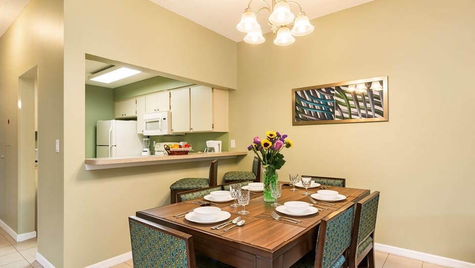 Dining Area • Table Setting & Kitchen Pass-Through