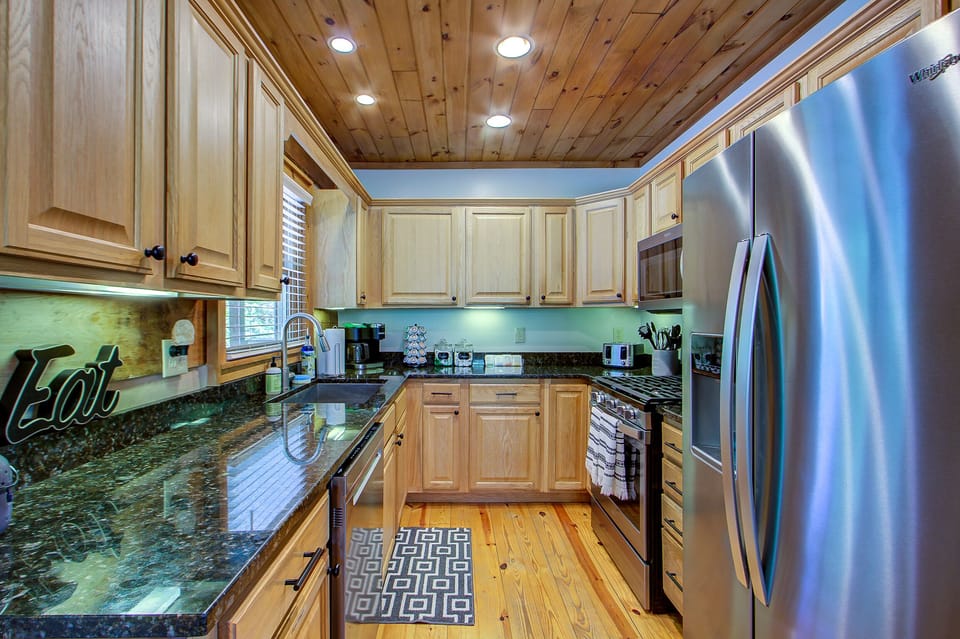 Fully equipped kitchen with coffee bar.