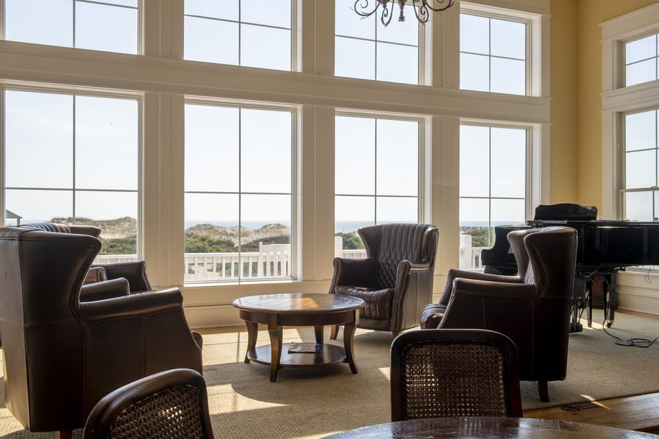 Gathering Space — The Fitzgerald Grand Living Room with Soaring Ceilings & Panoramic Ocean Views | Seats 40+ for Rehearsal Dinners, Corporate Sessions & Receptions
