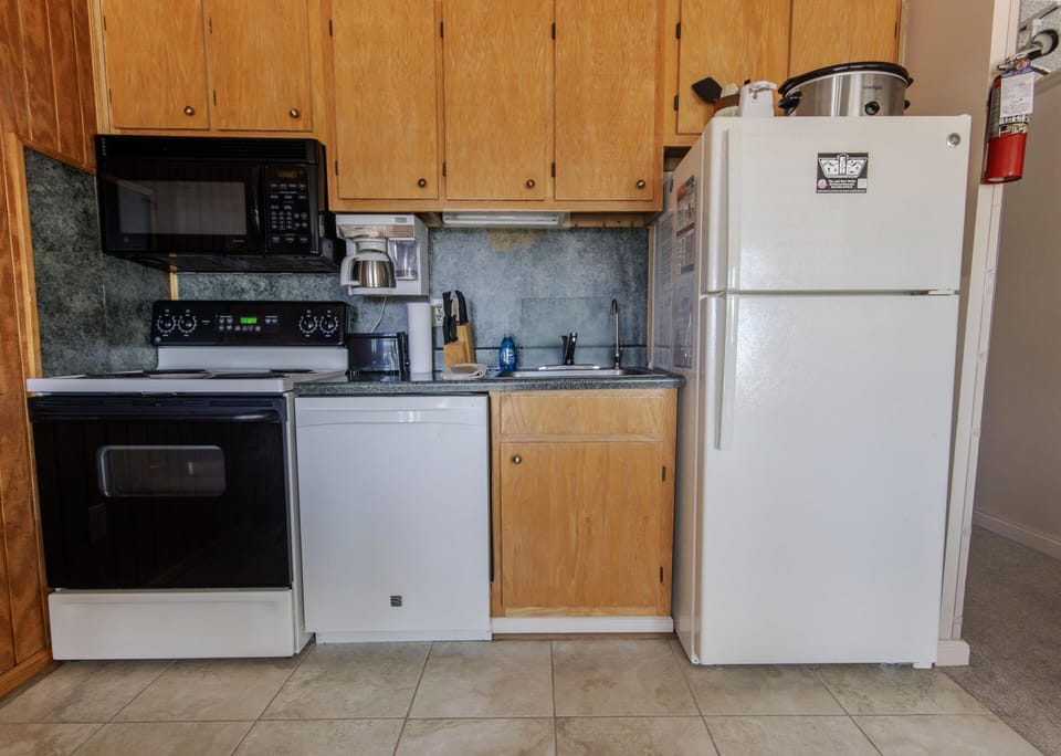 The kitchen is stocked with everything you'll need to make delicious meals.