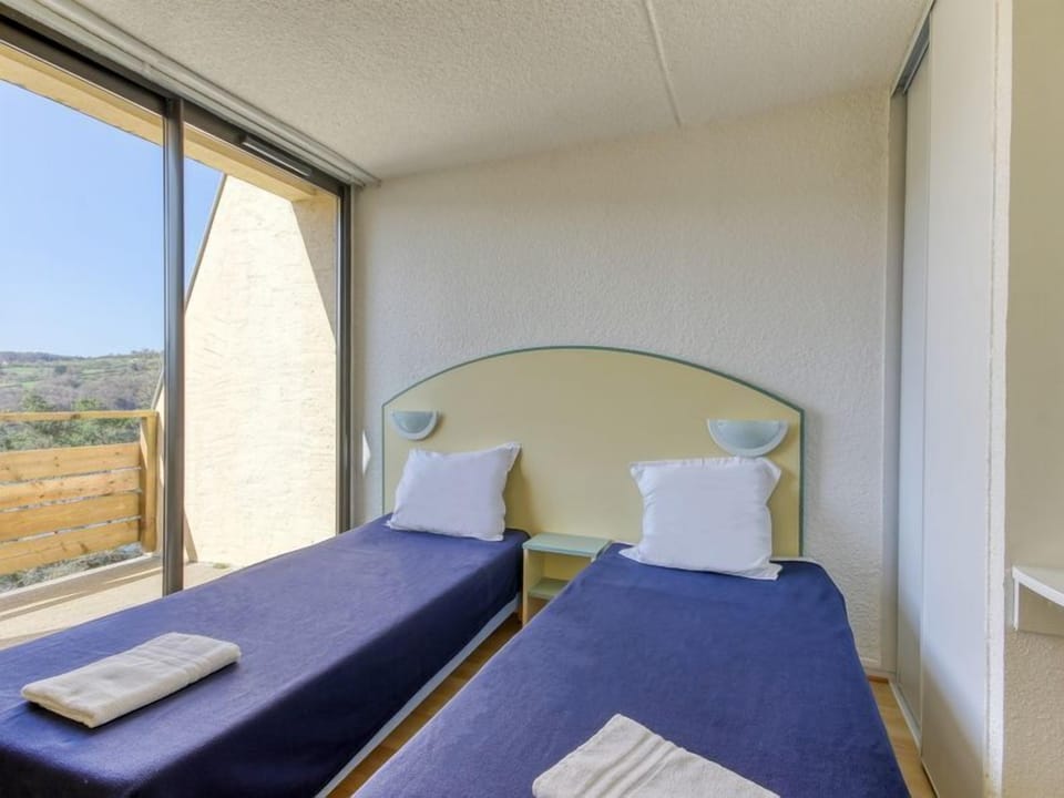 Get a peaceful night sleep in our cozy bedroom.