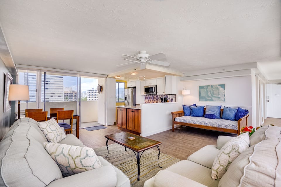 Floor to ceiling sliding windows on both sides. Sofa bed sleeps extra two guests