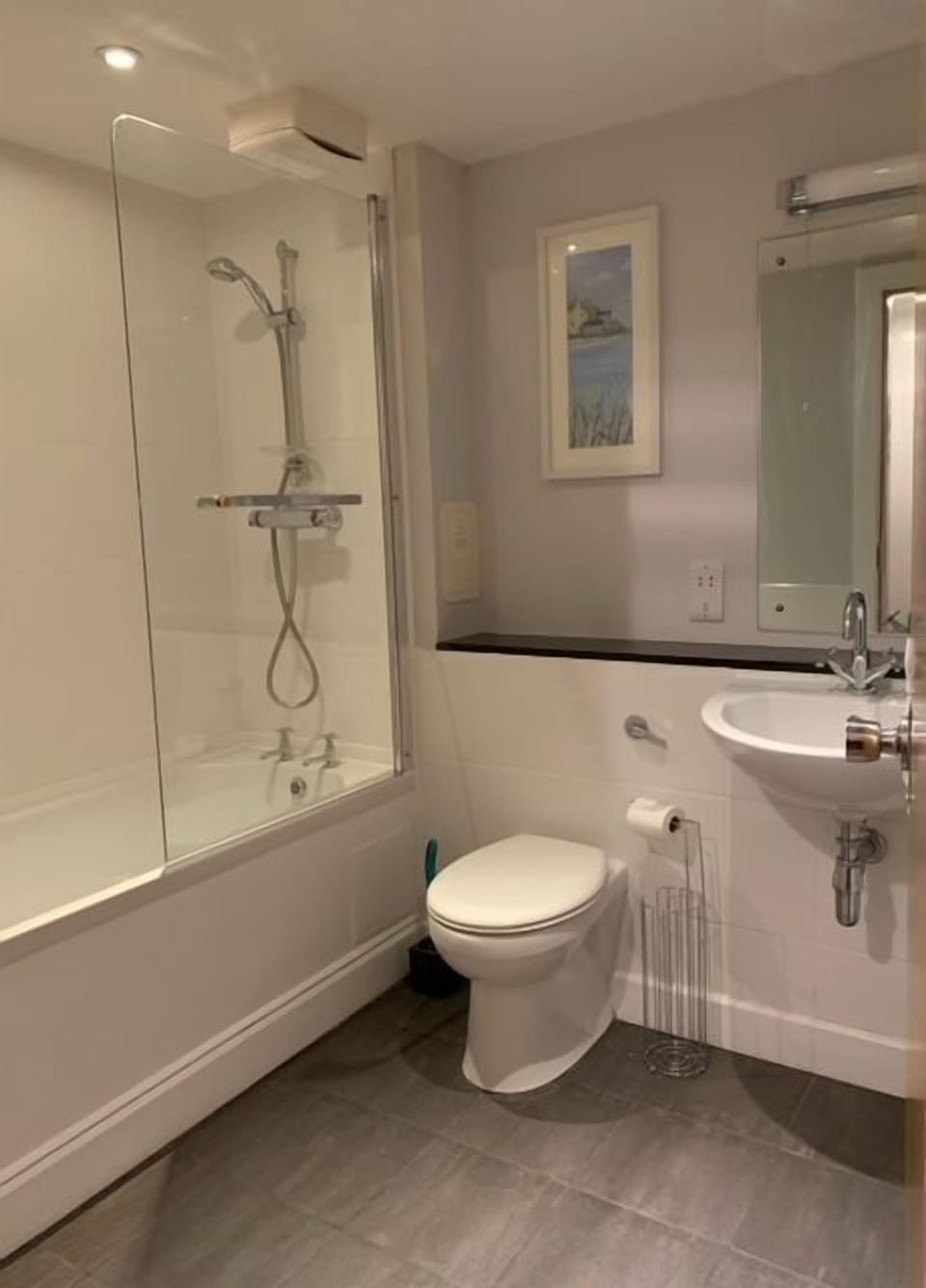 Bathroom with bath and shower