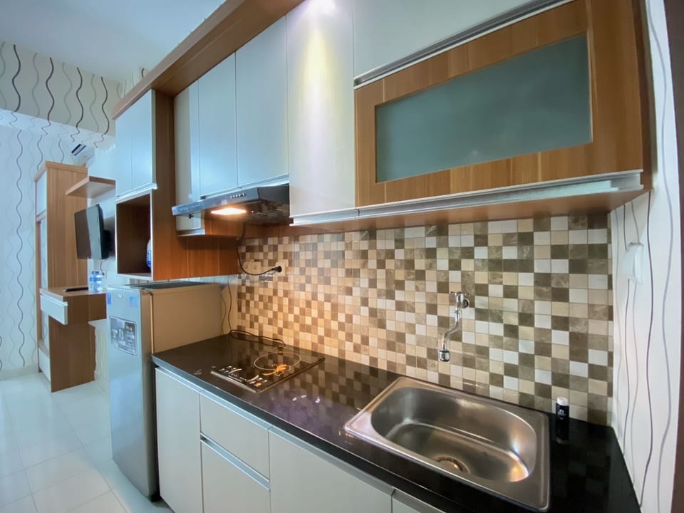 Fridge, stovetop, cookware/dishes/utensils