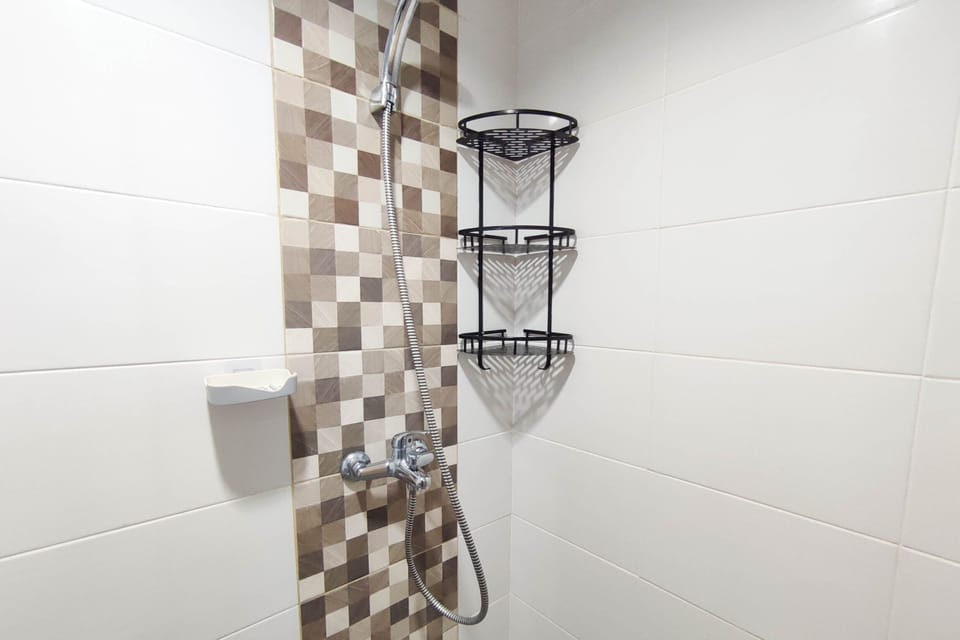 Shower, free toiletries, towels, soap