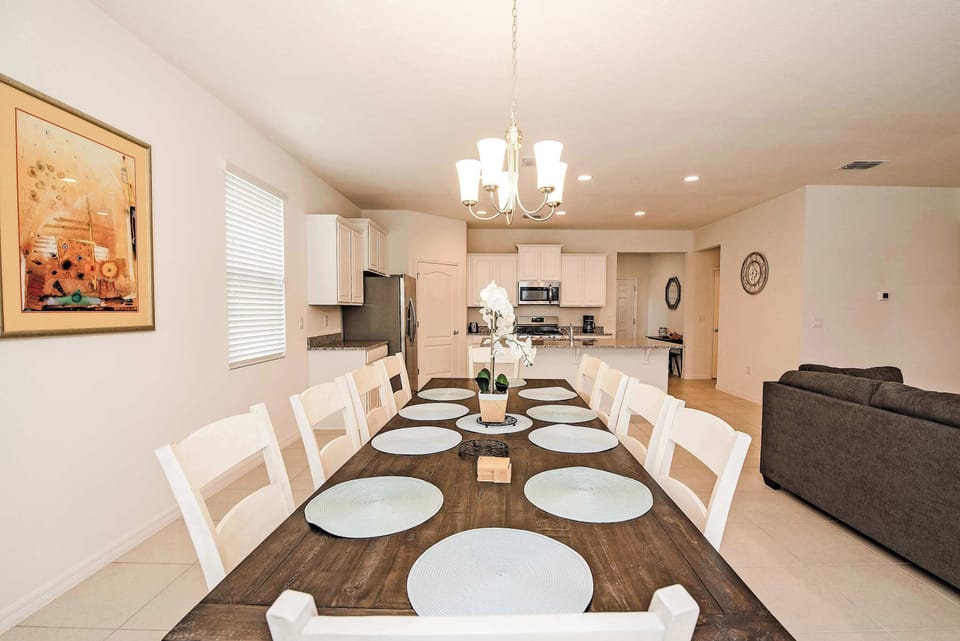 Elegant dining area with seating for eight, perfect for family gatherings and entertaining.