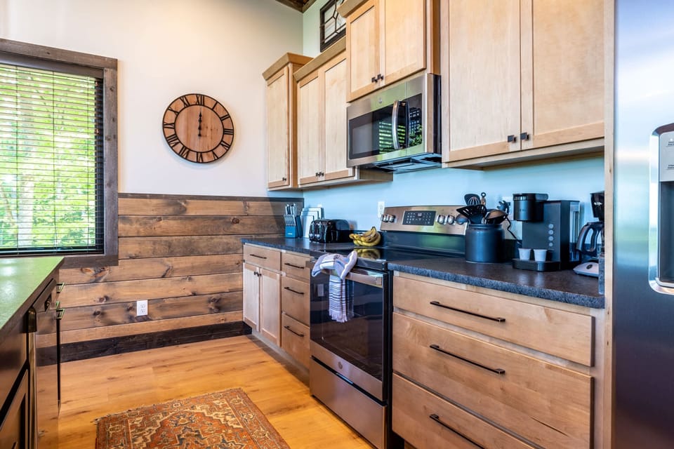 This kitchen is fully equipped with all your culinary essentials.