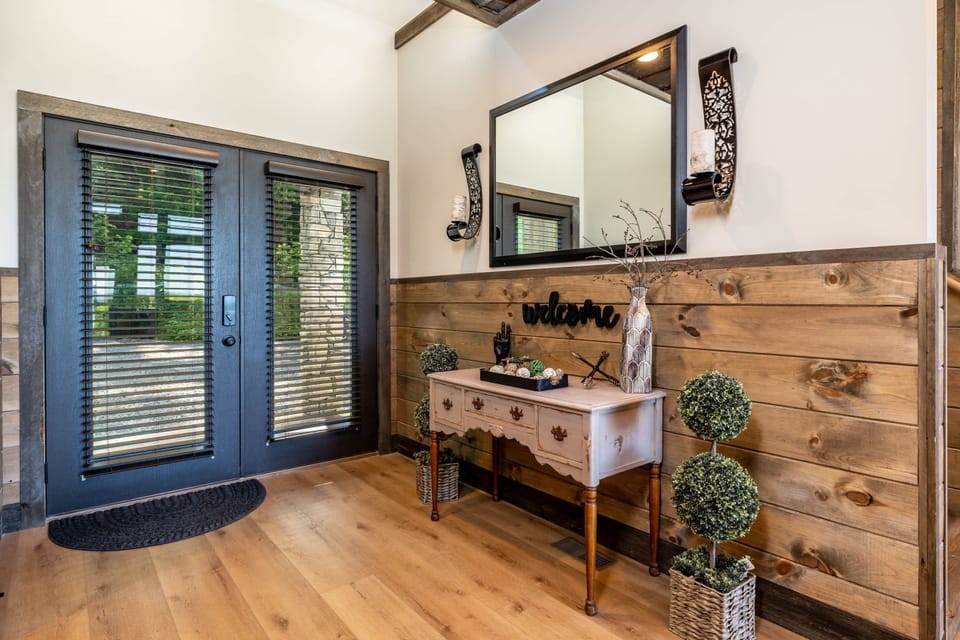 Step into a bright and welcoming entryway that sets the tone for the rest of this inviting space. 
