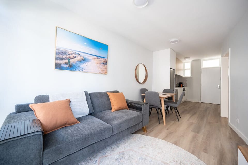 Light-filled and modern living room. Open plan lounge, dining and kitchen.
