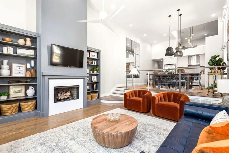The living room features ample sitting space. Perfect for game nights or a simple relaxing night in.