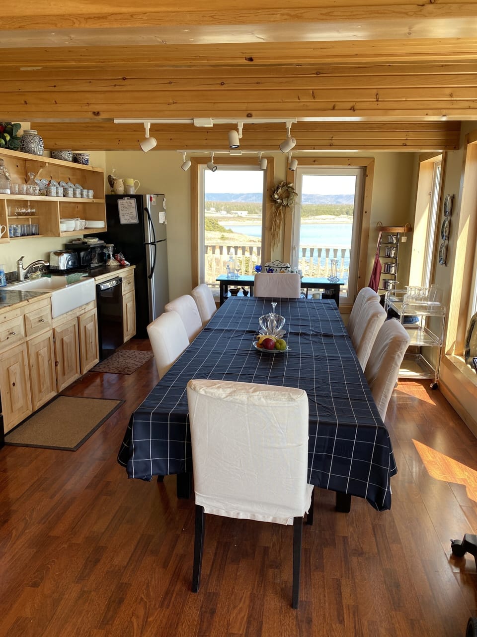 Spacious dining table for 8 with open concept fully equipped kitchen